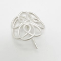 Detailed view of silver-colored alloy hair pin with abstract floral wire design and metal pin - Matte Silver Hair Hook