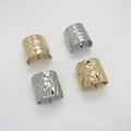 Set of four textured metal ponytail hair hooks in gold and silver finish with hammer pattern - Gold And Silver Assorted Set
