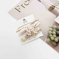 Detail of seashell and starfish hair clips set with pearls on a display card - Conch and Imitation Pearl Style