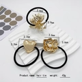 Coffret d'élastiques à cheveux dorés élégants avec breloques cœur, feuille et perle - Or (86-13)