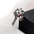 Vintage silver dragon ring with red stone eyes on a black display box and white fur - US 12 / Chinese Dragon Ring