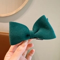Elegant dark green velvet bow hair clip with a silver metal duckbill base - Green