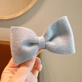 Elegant wool bow hair clip for girls in light grey blue with soft textured finish - Gray