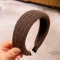 Knitted wide sponge headband in dark coffee color with ribbed texture and padded design - Brown