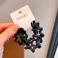 Elastic black wavy woven hair ring with high stretch texture and premium finish - Black