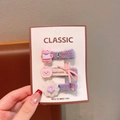 Three-piece purple plush hair clips set with pink kitten, apple, and crochet flower charms - Purple Series
