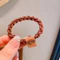 Brown braided high elasticity hair tie with a square smiley face charm detail - Coffee
