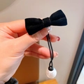 Elegant black velvet bow hair tie with white pearl charm detail and elastic cord - Black
