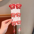 Lot de six barrettes papillon rouges avec pompons en perles pour le Nouvel An - Papillon avec Perle Blanche