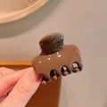 Glossy brown medium acrylic hair claw clip for women with smooth finish and secure grip - Chocolate