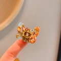 Mini vlinder haarklem van acetaat met bruin en blauw schildpadpatroon textuur - 5-Groen Koffie