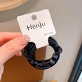 Elastic black woven hair band with grey bead on a branded display card - Black Bow