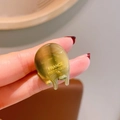 Mini olive green and amber acetate hair claw clip with gold France Handmade logo - Green Texture