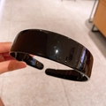 Cerchietto largo in acetato nero lucido dal design minimalista e stile francese - Nero