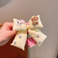 Yellow bow hair tie with 3D brown bear and Happy doggy label for girls' hairstyles - Yellow