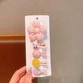 Sweet pink floral hair clip set with checkered bow and bunny decor on display card - Pink Series
