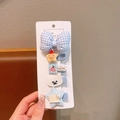 5-piece blue bow and plush star hair clip set for girls on a white display card - Blue Series