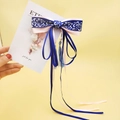 Vintage Chinese style navy blue and pink bow hair clip with floral patterns and tassels - Blue