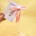 Barrette à cheveux avec nœud rose à franges et motifs floraux de style chinois - Rose
