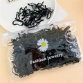 Bulk pack of black disposable elastic hair bands in a daisy print zipper pouch - 10# Black (Approx. 1000 Pcs)