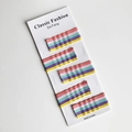 Set de 25 horquillas mate de colores macaron en tarjeta blanca para niñas - Ola Amarilla