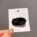 Niedliche schwarze Katzen-Haarklammer aus Acetat mit goldenen Details auf Karte - Schwarz