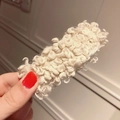 Plush teddy wool hair clip in cream beige color with soft curly texture for winter - Beige