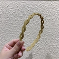 Matte khaki wavy headband for women with anti-slip inner teeth and twist design - Yellow