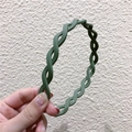 Forest green wavy twisted headband with a matte finish and anti-slip inner teeth - Green