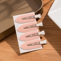 Pink seamless hair clips set of 4 for makeup styling on a white display card - Pink