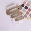 Set di tre fermagli per capelli opachi color kaki in varie dimensioni su cartoncino - Cammello Stile 1