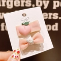 Set of two cute pink bow and peach hair clips for girls on a white display card - Pink Peach