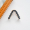 Elegant V-shaped metal hair claw clip with dark grey marble texture and gold finish - Gray