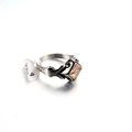 Detail of punk style stainless steel ring with orange gemstone and size 10 tag - US 8 / Yellow