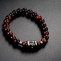Retro tiger eye beaded bracelet with silver skull charm and titanium steel accents - Red (Red Tiger Eye)