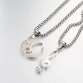 Macro detail of music note and moon pendants with crystals and I love you engraving - Music Note / Silver Jewelry Set