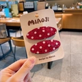 Paio di fermagli per capelli rossi glitterati a pois bianchi su scheda espositiva - Rosso rosa