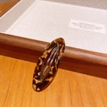 Classic tortoiseshell oval hair clip with gold Barrette La France elegant text logo - Coffee