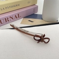 Vintage brown resin bow hair clip with silver metal barrette for elegant hairstyles - Coffee Bow
