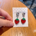 Kids clip-on earrings featuring red strawberry charms with sparkling heart crystals - Strawberry
