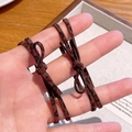 Lot de deux élastiques à cheveux nœud marron foncé avec motif léopard pour femme - Style Nœud (2-Nœud) / Corde à cheveux noeud