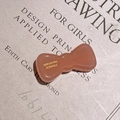 Caramel acetate bow hair clip featuring handmade France engraving on the back - Pink
