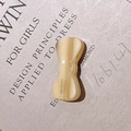 Creamy beige acetate bow hair clip with black France Handmade lettering detail - Cream White