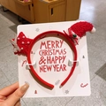Simpatico cerchietto natalizio rosso con mini cappello di Babbo Natale in peluche e stella - Stella e Corna