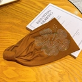 Caramel brown fabric headband with iridescent rhinestone hibiscus flower and knot detail - Brown
