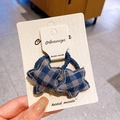 Set of two star-shaped hair ties featuring grey and blue plaid fabric patterns - Star Hair Tie