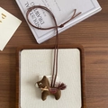 Handmade brown pony plush pendant with red plaid saddle and fringe tail detail - Brown Pony