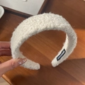 Modieuze crème wolmix spons hoofdband met handgemaakt label aan de binnenzijde - Broken Wit