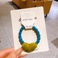 Blue beaded elastic hair tie with yellow velvet heart charm on display card - Blue Ring Yellow Heart