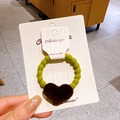 Elastic green velvet hair tie with a brown heart plush charm on a handmade display card - Yellow Ring Dark Brown Heart